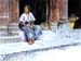 WomanSellingDolls